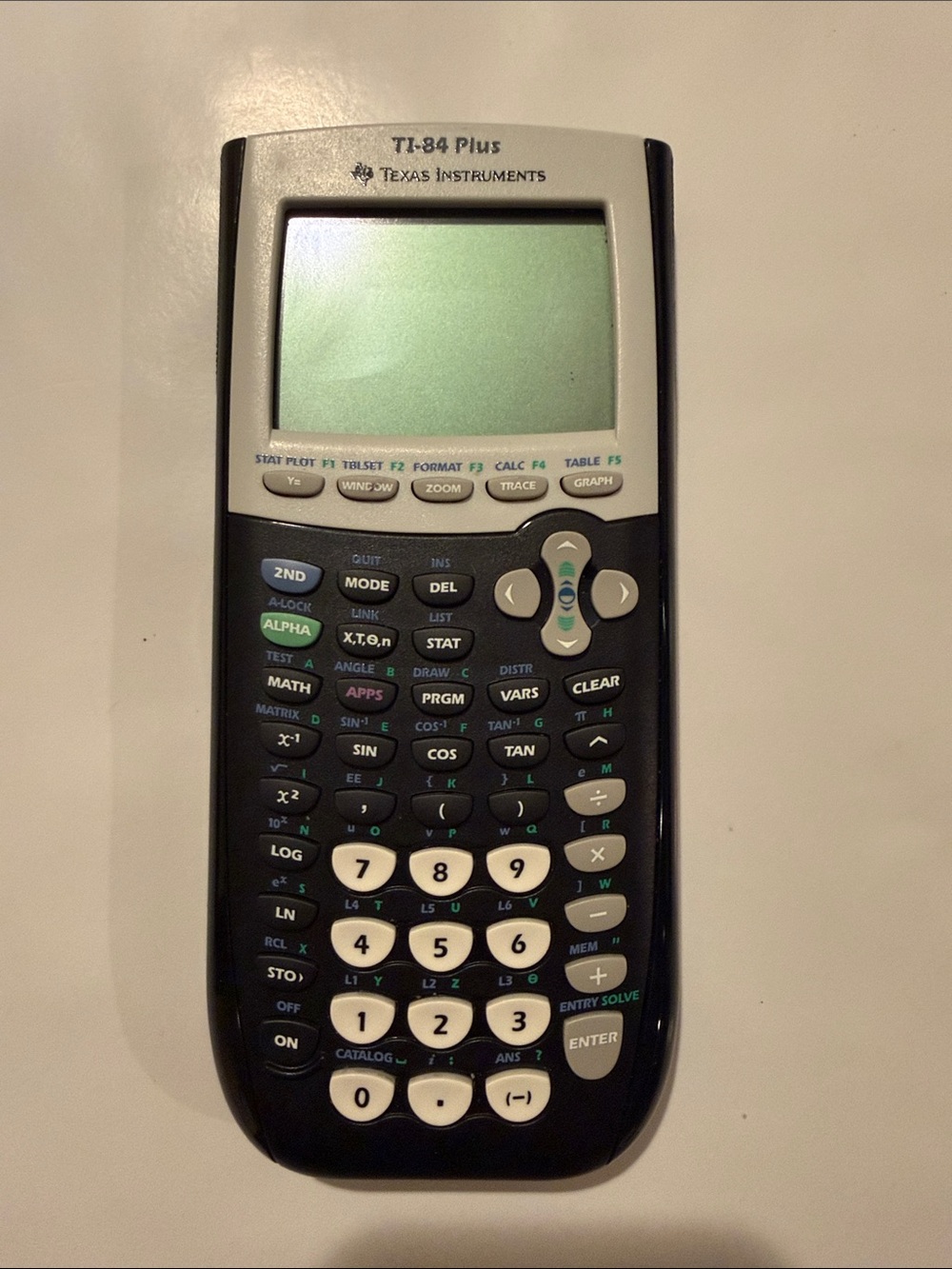Texas Instruments TI-84 Plus Graphing Calculator in Black and White